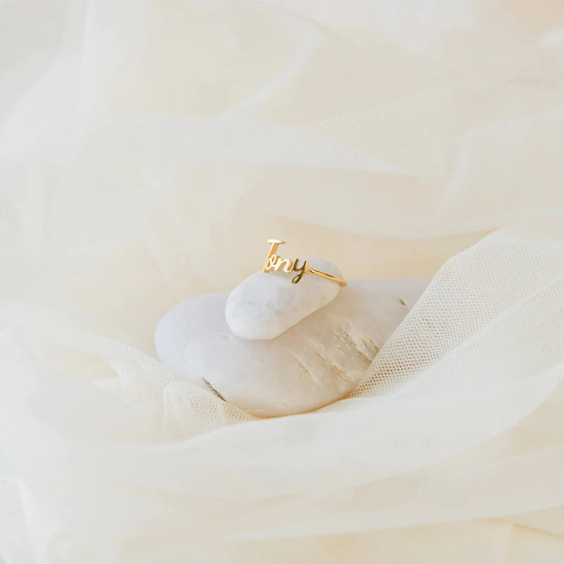 LAVISH GRACE SCRIPT RING